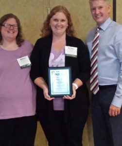 Pictured: (Left to right) Krista Hoevel, Dr. Michael Johnson, Dr. Hugh Hanlin and Dr. Jim Dalton after Hoevel received the Bobby Jones Award at the 12th annual conference of the IN-AJSOP, a statewide professional organization for individuals and organizations working with youth with sexual behavior problems.